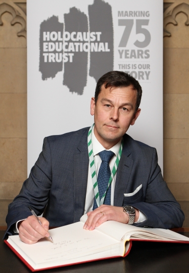 Nick Fletcher MP signing the Holocaust Educational Trust's Book of Commitment